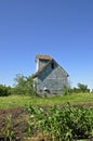 Old granary viewed from a field of corn Royalty Free Stock Photo