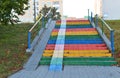 Old granite staircase is close, stairs, texture, colored in rainbow colors