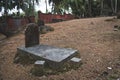 An old grave in an abandoned cemetery of the 19th century in the Andaman Islands Royalty Free Stock Photo