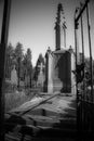 Old grave monument with fence in the sun