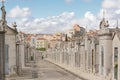 Old graves in Alto de Sao Jao cemetery,with city of Lisbon in the distance