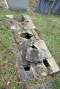 Old Graveyard with Broken and Fallen Crosses and Graves in Overgrown Grass Spooky