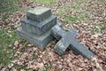 Old Graveyard with Broken and Fallen Crosses and Graves in Overgrown Grass Spooky