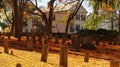 SOUTHBRIDGE, MASSACHUSETS. USA - NOVEMBER 17 2017. Old graveyard in a small town in New England with stone tombs autumn leaves fal Royalty Free Stock Photo