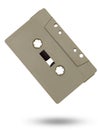 Old gray audio cassette for tape recorders isolated on a white background Royalty Free Stock Photo