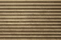 Old gray brown dirty dusty metal wall of the blinds with horizontal lines. rough surface texture Royalty Free Stock Photo