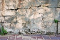 Old gray cement wall surface with cracks. dirty cement walls with rough surface. Texture of old gray concrete wall Royalty Free Stock Photo