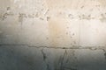 Old gray cement wall surface with cracks. dirty cement walls with rough surface. Texture of old gray concrete wall Royalty Free Stock Photo