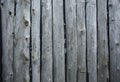 Old gray cracked boards, background, texture, wallpaper, hammered nails, sticking stalks, weathered, retro, grunge, vintage