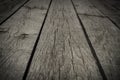 Old gray floorboards with gaps, closeup, background, texture Royalty Free Stock Photo