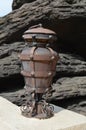 Old gray lamp with rusty details