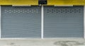 Old gray roller shutter door Royalty Free Stock Photo