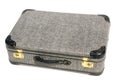 Old gray suitcase on white background
