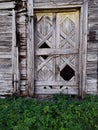Old gray wooden manor ruins door Royalty Free Stock Photo
