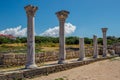 Old Greek columns remains of ancient Byzantian basilica. Old ruins in archaeological park Chersonesus