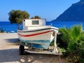 Old Greek fishing boat pulled ashore Royalty Free Stock Photo