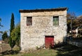 Old Greek Mountain Village Stone House With Red Wooden Door Royalty Free Stock Photo