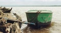 Old green boat with oars Royalty Free Stock Photo