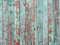 Old green crackle paint on a wooden background.