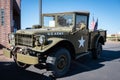 Old green Dodge M37 pickup military truck with the white star of the U.S. ARMY