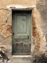 Old green door at abandoned house in Bakar,Croatia Royalty Free Stock Photo