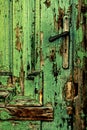 Old green door close-up with handle Royalty Free Stock Photo