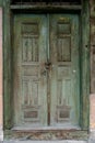 Old green door.Locked