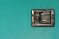 A old green door with a old vintage keyhole stainless steel and padlock, closeup of photo Royalty Free Stock Photo