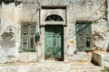 Old green door and windows of the house Royalty Free Stock Photo
