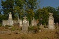 Old green graveyard in the Romanian countryside