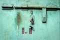 Old grunge metal door with padlock Royalty Free Stock Photo