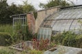 Old green house and cold frames in an allotment Royalty Free Stock Photo