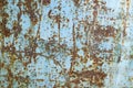 Old iron sheet with peeling brown paint and rusty spots. Royalty Free Stock Photo