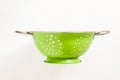 Old green metal colander sieve Royalty Free Stock Photo