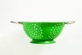 Old green metal colander sieve Royalty Free Stock Photo