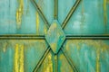 Old green metal gate with rivets. Royalty Free Stock Photo