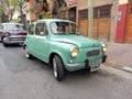old 1970s Fiat 600 sedan two door rear engined unibody parked in the street. Classic car show Royalty Free Stock Photo