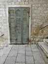 Old green shutter door