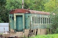 old green train car with orange roof. Royalty Free Stock Photo
