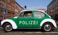 Green VW beetle police car