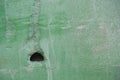 Old green wall with battered paint Royalty Free Stock Photo