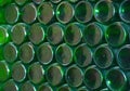 old green wine bottles stacked Royalty Free Stock Photo
