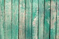 Old green wooden fence. painted boards. vintage wood texture Royalty Free Stock Photo