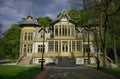 Old green wooden house in skansen in Lodz - Open-air Museum - Wooden Architecture - Central Museum of Textiles Royalty Free Stock Photo