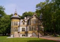 Old green wooden house in skansen in Lodz, Poland - Central Museum of Te Royalty Free Stock Photo