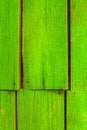 Old green wooden planks, lime rural wood fence background