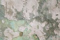 Old grey and green stained plaster wall. Grunge wall texture background Royalty Free Stock Photo