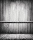 Old grey grunge empty book sheves on wooden wall Royalty Free Stock Photo