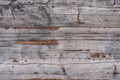 Old grey scratched wooden top background