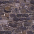 An old grey stone wall. Grey stone background. Brick texture. Brickwork. Royalty Free Stock Photo